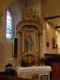 Eglise. Autel latéral nord dédié à la Vierge.